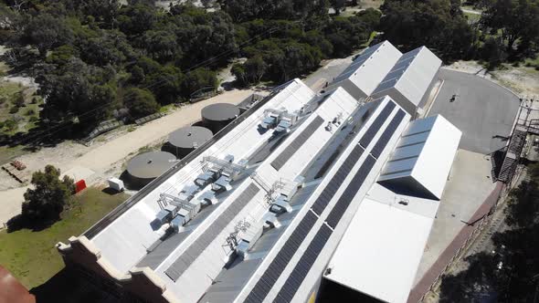 Aerial View of a Warehouse with Solar Panels in Australia