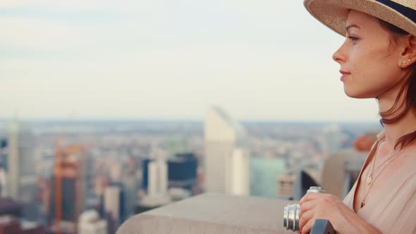 Beautiful woman on the roof of New York