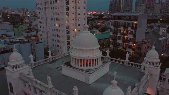 Dramatic pulling out shot of large catholic church in Binh Thanh district Saigon or Ho Chi Minh City