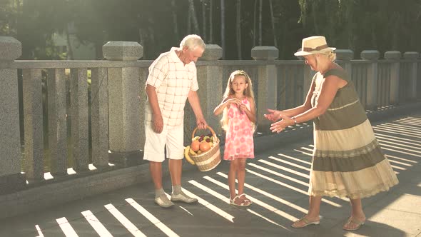 Cute Couple of Seniors with Grandchild.