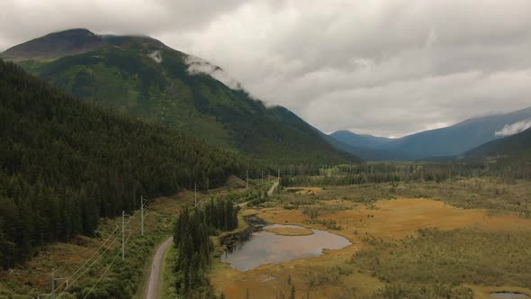 View of Scenic Road Surrounded By Mountains