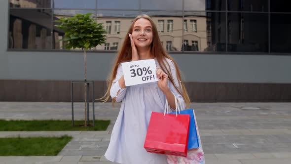 Smiling Girl Showing Up To 30 Percent Off Inscriptions Signs, Rejoicing Good Discounts, Low Prices