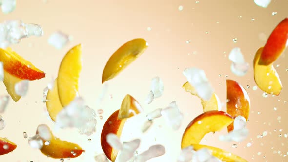 Super Slow Motion Shot of Flying Fresh Peach Slices and Crushed Ice at 1000 Fps.