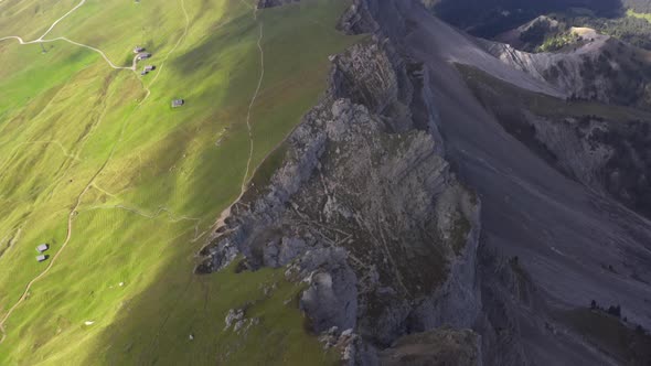 Lush Green Fields on Seceda Mountain in Italy Clear Skies Toward the Horizon