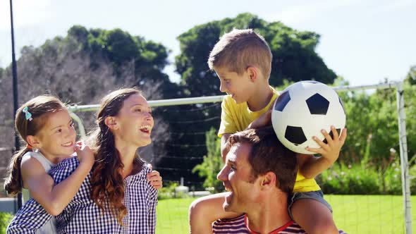 Happy family enjoying in park