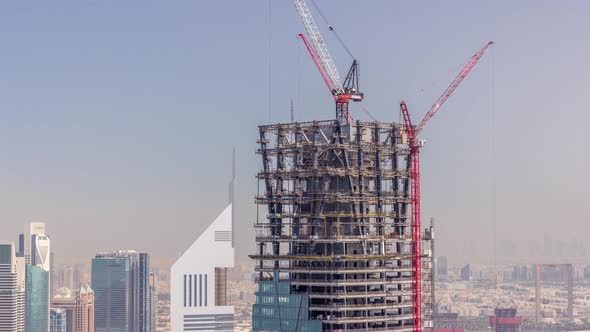 Construction of New Modern Skyscraper in Dubai City Aerial Timelapse United Arab Emirates
