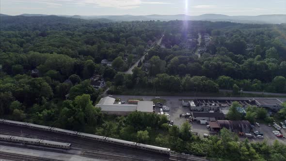 View of  Brewster New York,  Moving Train in Seen From a Distance