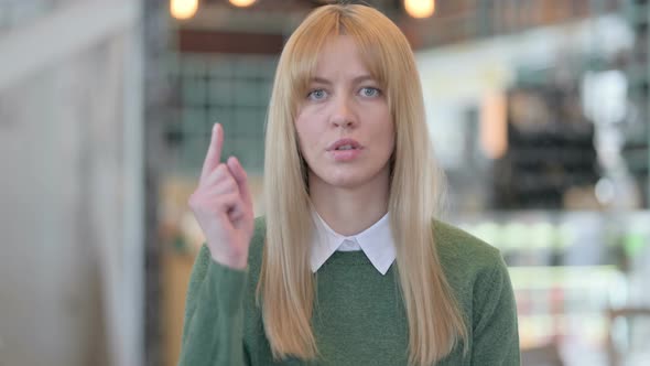 Portrait of Angry Young Woman Fighting Arguing