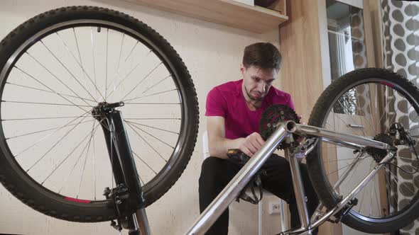 Confused Stupid Young Tries to Attach Front Chainring of Bike to the Frame