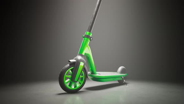 Green electric scooter standing in a spotlight. A modern way of city travel 4KHD