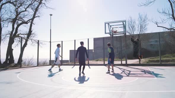 Group of People Playing Basketball Outdoors Slow Motion