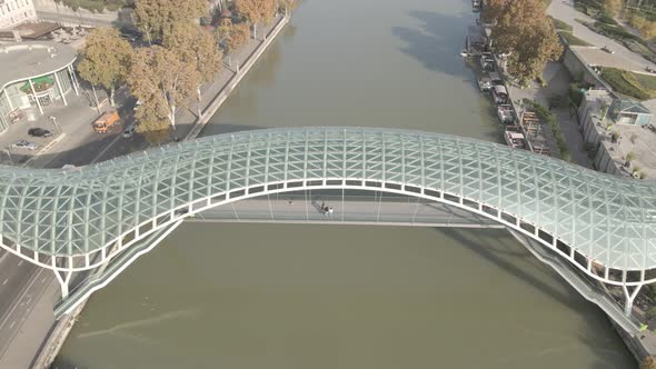 Aerial view of Tbilisi city central park and Bridge of Peace