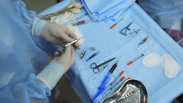 Microsurgical instruments on table. Close up view of surgical tools lying on table