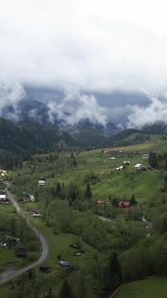 Vertical Video Village in the Carpathian Mountains in Autumn