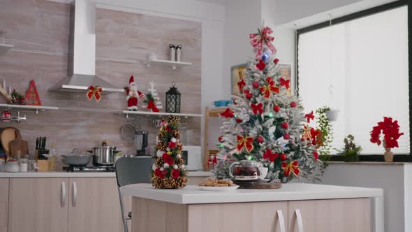 Empty Xmas Decorated Kitchen with Nobody in It is Ready for Christmas Morning Dessert