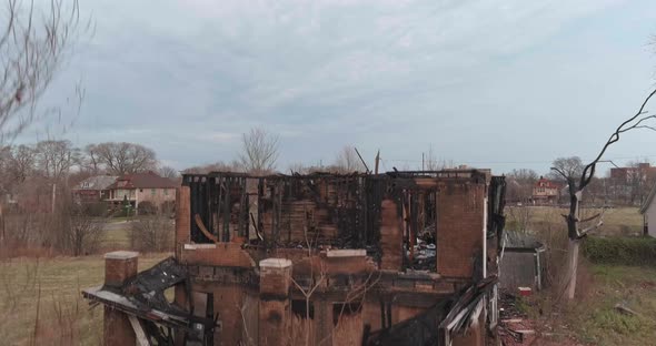 Drone view of dilapidated house in a Detroit neighborhood. This video was filmed in 4k for best imag