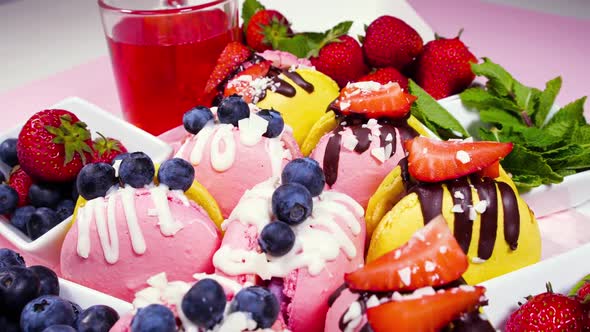 Handmade Beautiful Macaroon Sweet Food Dessert with Fresh Strawberries and Blueberries Decorated
