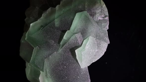 Fluorite crystals show their natural beauty as they shimmer in this unusually large specimen.