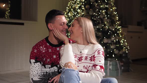Couple Is Sitting Floor Background Decorated Christmas Tree