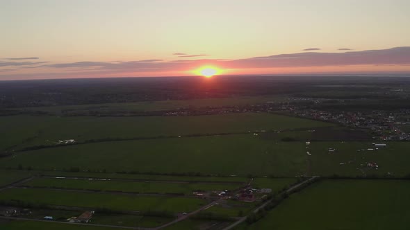 Sunset in fields. Drone Shots