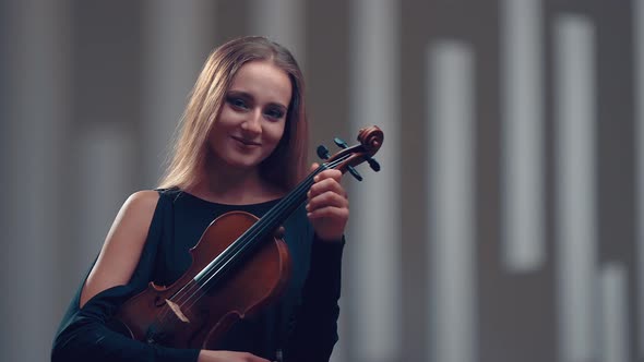 Girl Violin Playing at Studio, Woman Is Practicing Playing Musical Instrument