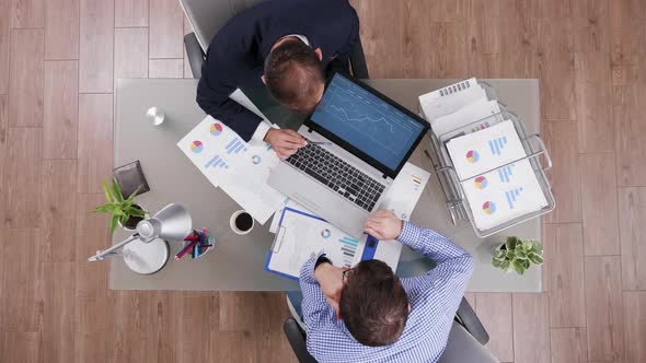 Top View of Businessman in Suit Having a Breefing