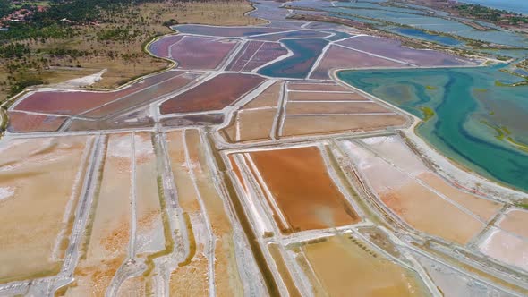 Aerial view of big salt industry near a coastal village, Brazil.