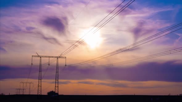 Timelapse of the Sky at Sunset Against the Background of an Electric Pole with Wires