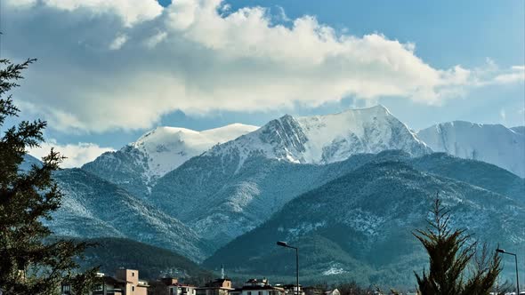 Time-lapse of Large Snowy Alpine Mountain with Clouds Moving at Denizli, Turkey.