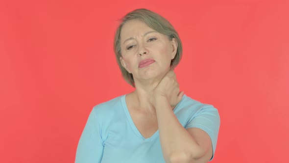 Old Woman with Neck Pain on Red Background