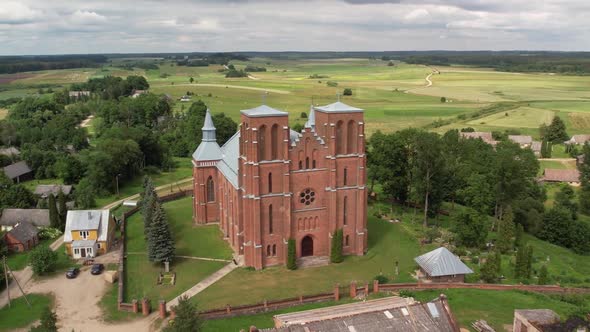 Pseudo-gothic style red brick countryside church