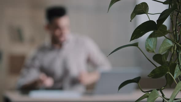 Young Happy Arabian Male Student Business Man Drummer Having Fun at Home Workplace Pretend Playing