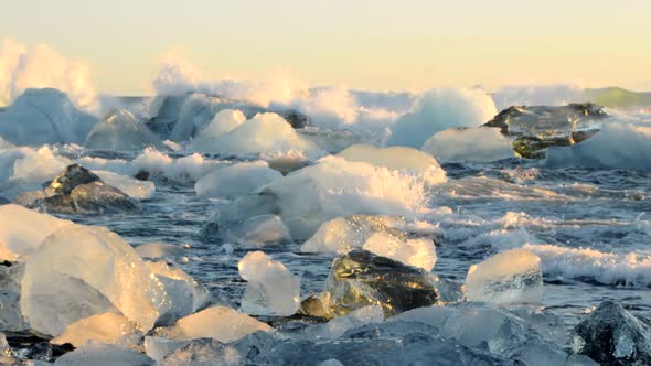 Icebergs Floating and Melting in Stormy Ocean