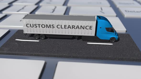 Trailer Truck with CUSTOMS CLEARANCE Text on the Keyboard alt