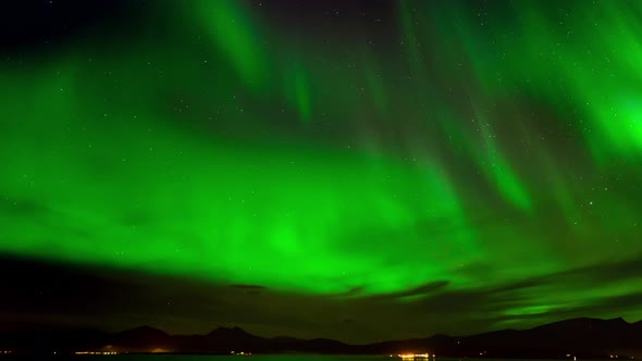 Timelapse of Amazing Beautiful Green Northern Light or Aurora Borealis in the Night Sky