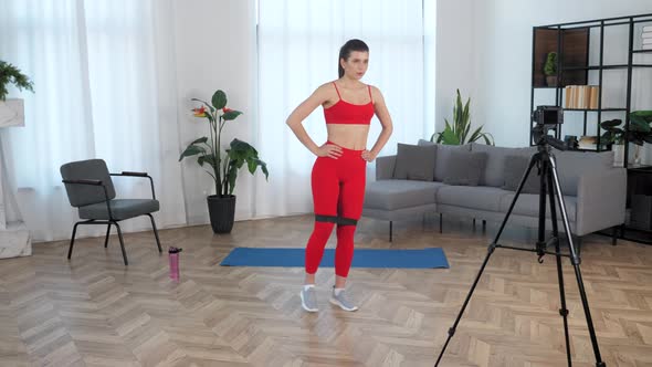 Sport Muscular Woman Records Online Master Class on Camera Workout at Home