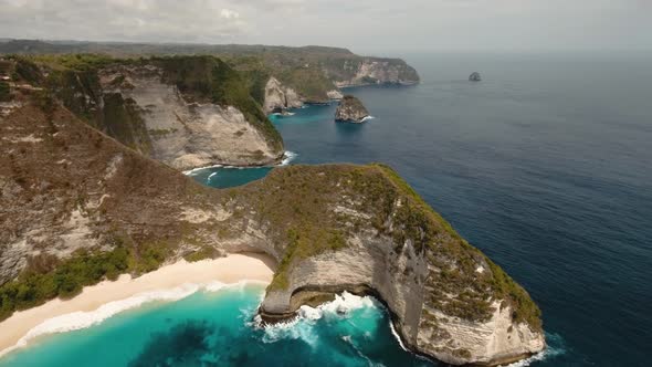 Rocky Cliff with Beach in the Sea