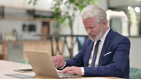 Hardworking Senior Old Businessman Having Headache