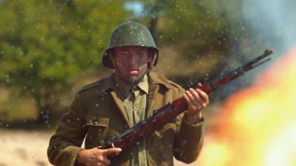 WW2 soldier and explosion on the battlefield, Ultra Slow Motion alt