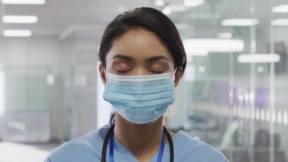 Portrait of female doctor wearing face mask in hospital