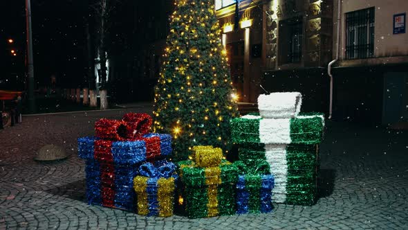 Giant Christmas Presents Near a Beautifully Decorated