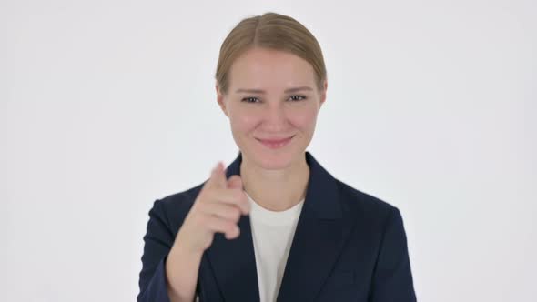 Young Businesswoman Pointing at the Camera on White Background