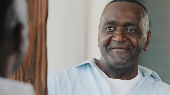 Close Up Portrait Mirror Reflection Happy Senior Retired African Adult American Man with Bristle