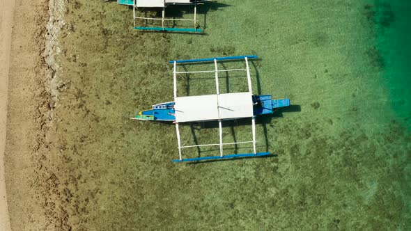 Boat on the Surface of the Turquoise Water