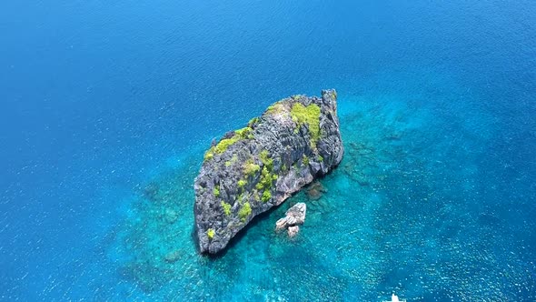 Wide aerial shot of North rock dive site, El Nido, Palawan, Philippines