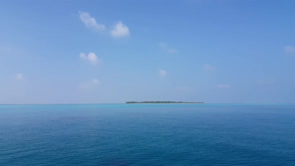 Luxury drone abstract view of a white paradise beach and blue sea background in vibrant 4K