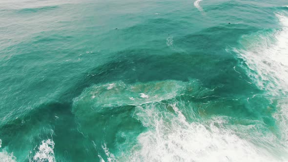 Picturesque Ocean with Rolling Waves on Sunny Day Upper View