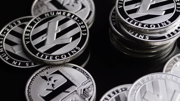 Rotating shot of Bitcoins (digital cryptocurrency) - BITCOIN LITECOIN 373