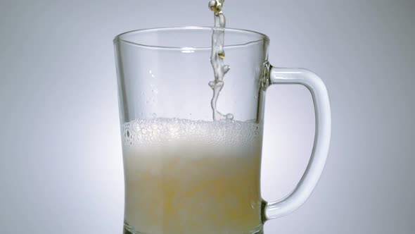 Beer being poured into mug, Slow Motion