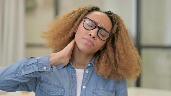 Portrait of African Woman Having Neck Pain